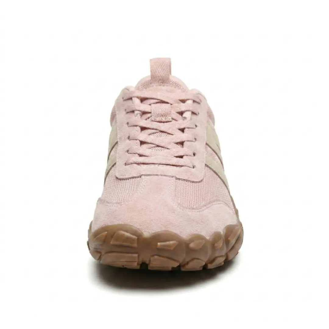 Front view of the pink shoe showing the wide rounded toe, laces and chunky tan rubber sole edge. 17
