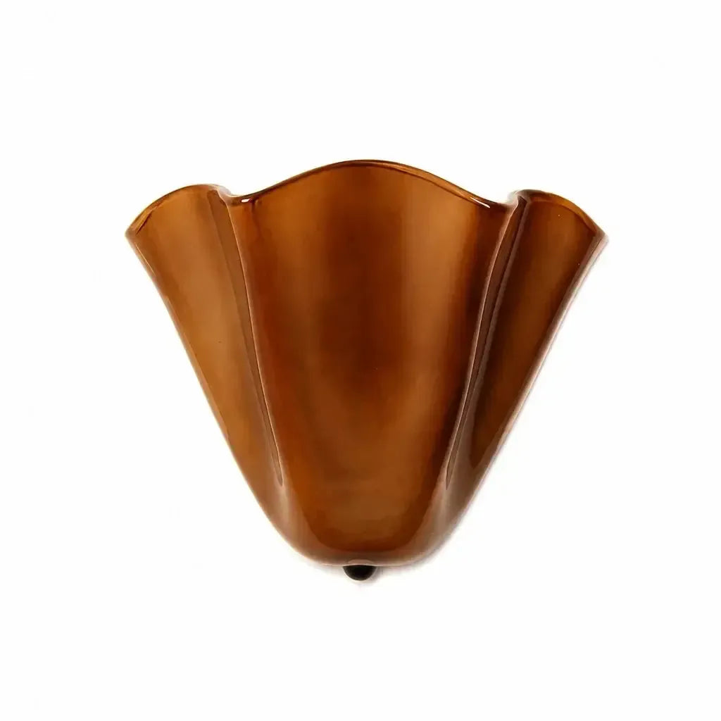 Amber-brown glazed sconce with a ruffled rim and dark fixing at the base, shown alone against a white background. 12