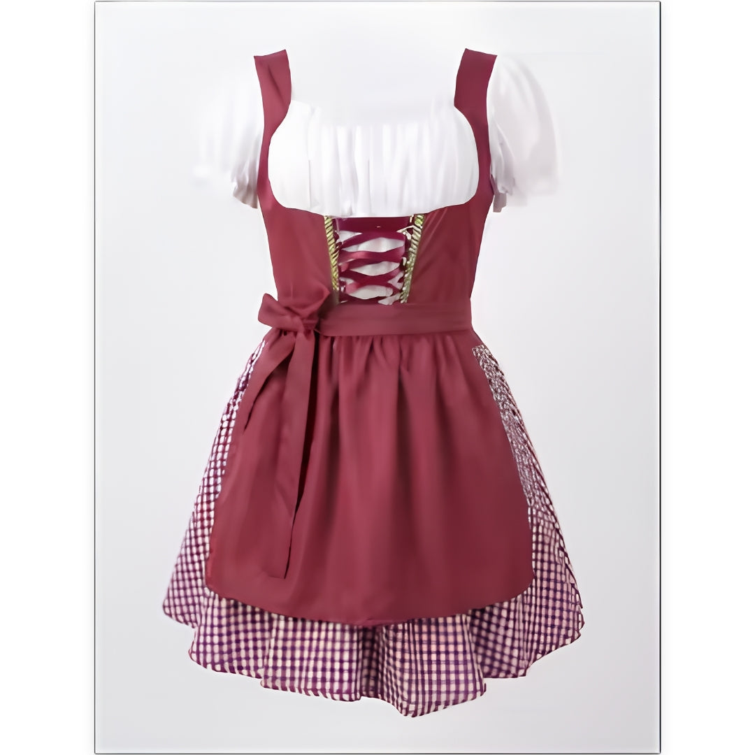 Burgundy dirndl on a mannequin, front view, showing white puff sleeves, laced bodice, tied apron and checked underskirt. 1