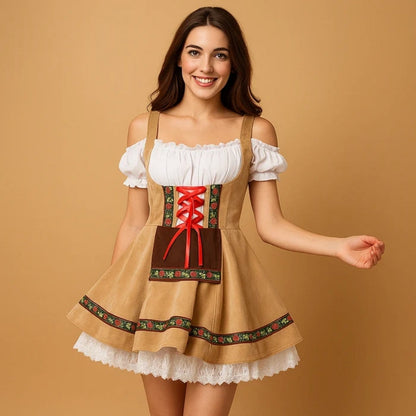 Smiling model in a tan dirndl with red satin lacing, floral ribbon trim, brown apron panel and layered white lace petticoat. 3