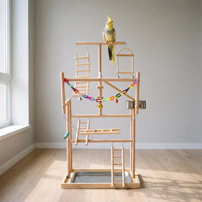 Wooden play stand in a bright, empty room with a yellow-crested cockatiel perched on the top bar. 2