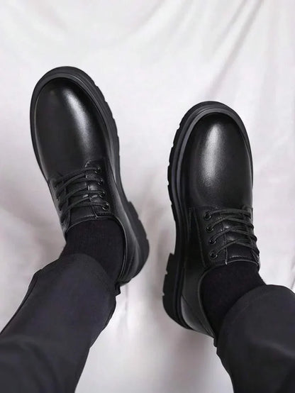 Top-down view of both shoes worn, showing rounded toes, laces and thick sole edges 4