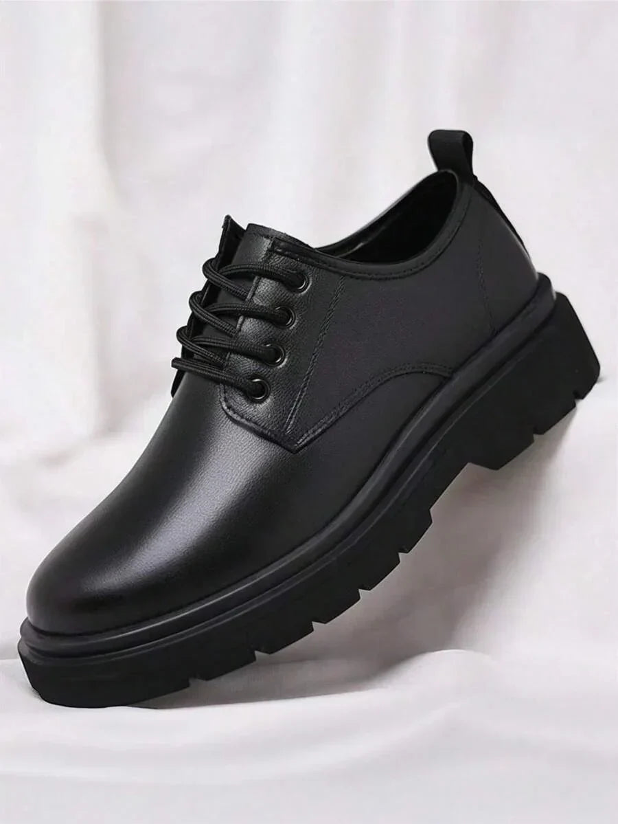 Single glossy derby shoe at an angle, showing four-eyelet lacing, heel pull tab and chunky sole 5