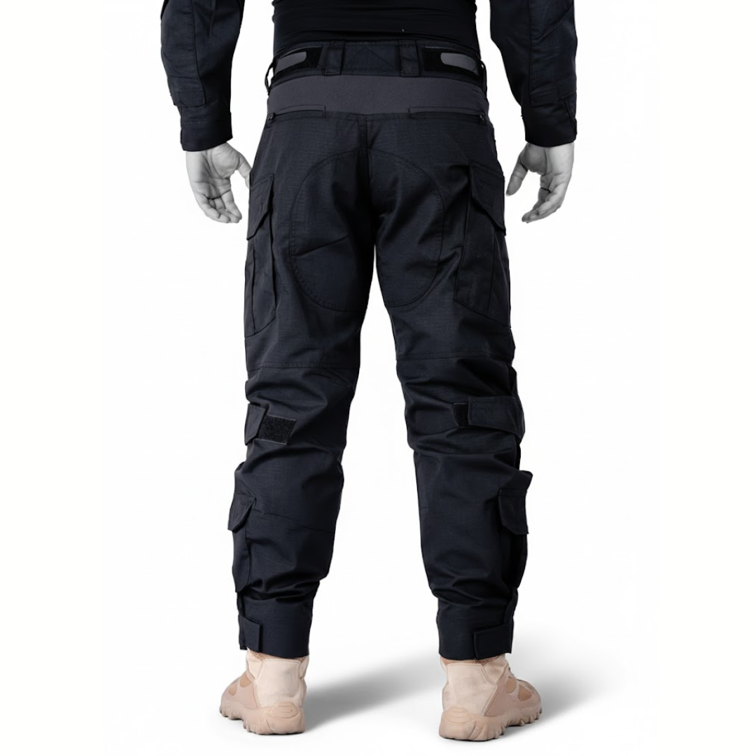 Straight back view of the black trousers on a mannequin, showing the waistband, rear panels, calf pockets and hook-and-loop cuffs. 10