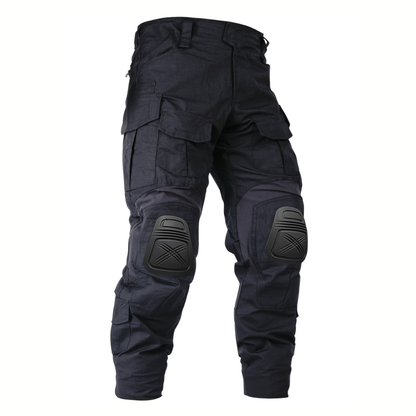 Black ripstop cargo trousers from the front on a white background, showing flap pockets and moulded hard knee pads. 1