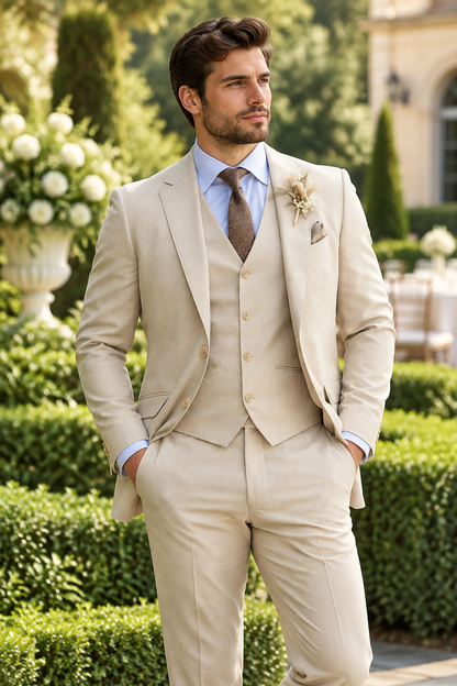 Man in a beige three-piece suit with blue shirt and brown tie in a formal garden 1