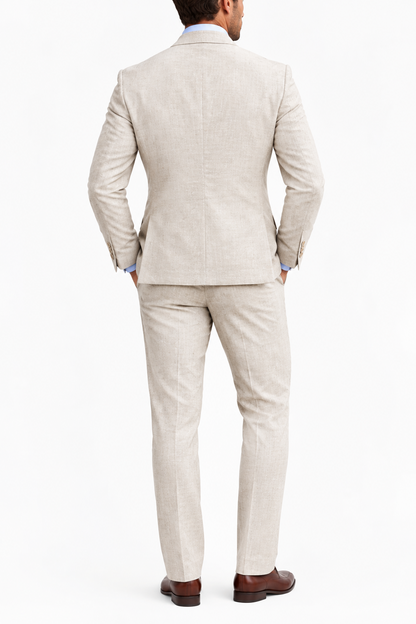 Back view of the beige suit jacket and trousers, worn with brown leather shoes 7