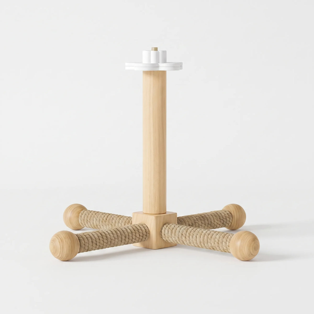 Wooden bird perch with a central post, white flower-shaped mounting plate and four natural rope-wrapped arms ending in wooden balls, on a plain background. 1