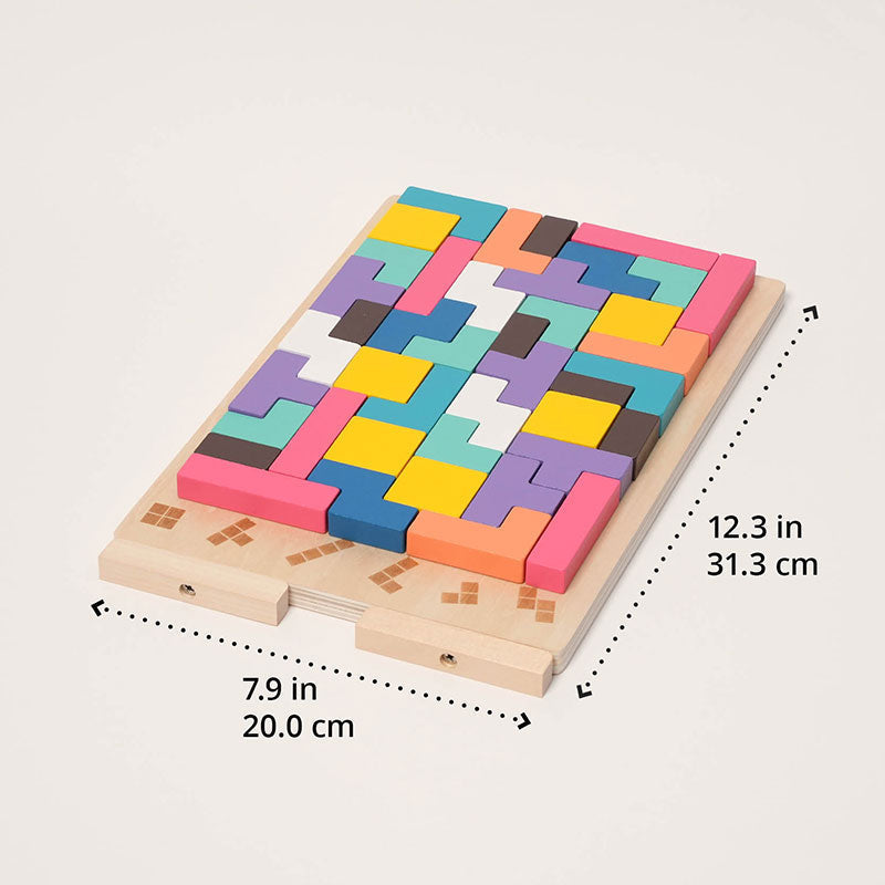Board filled with a completed block pattern, shown at an angle with dotted lines marking its width and length in inches and centimetres. 6
