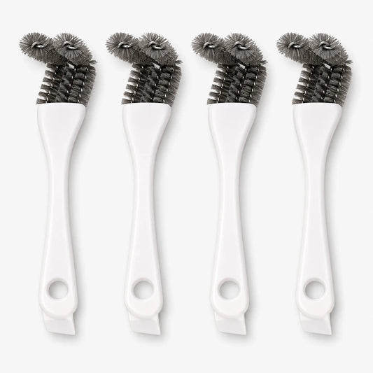 Four white-handled cage brushes standing upright side by side, each with a hanging hole and angled grey bristle heads. 1