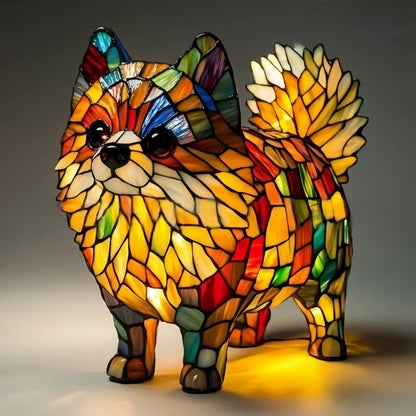 Standing pomeranian-style lamp with a fluffy tail made of overlapping orange and cream glass pieces and red and green accents. 18