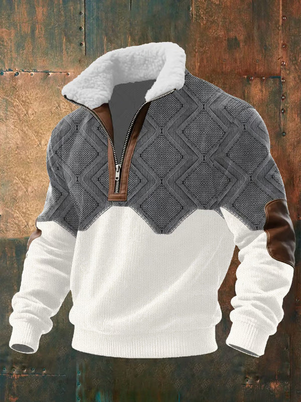 Grey and white diamond-knit version on a rusty metal backdrop, showing the zip, brown trim and elbow patches 2