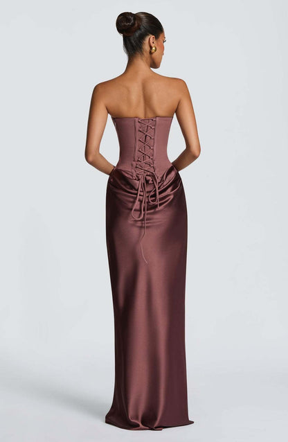 Mauve-brown corset dress from a three-quarter angle, showing the draped hip detail 17