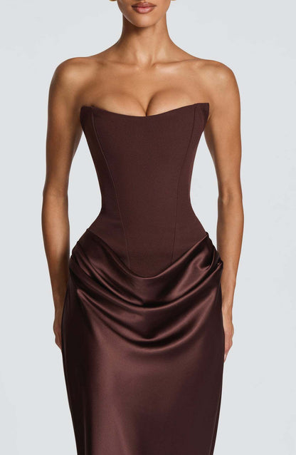 Brown corset maxi dress front view, hands by sides, showing full-length satin skirt 14
