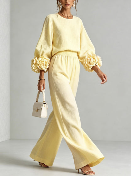 Pale yellow version of the set worn by a model walking, flower cuffs swinging with her arms 7