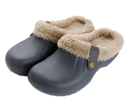 Pair of grey clogs with beige faux fur lining, shown together on a white background 15