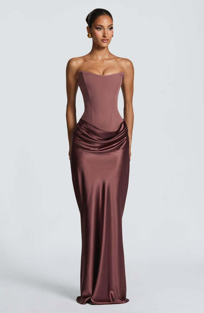 Close-up of the brown corset bodice and gathered satin drape at the hips 15