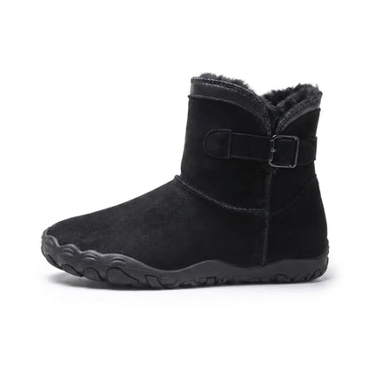 Side view of a single black suede ankle boot with dark fleece lining and buckled strap 10