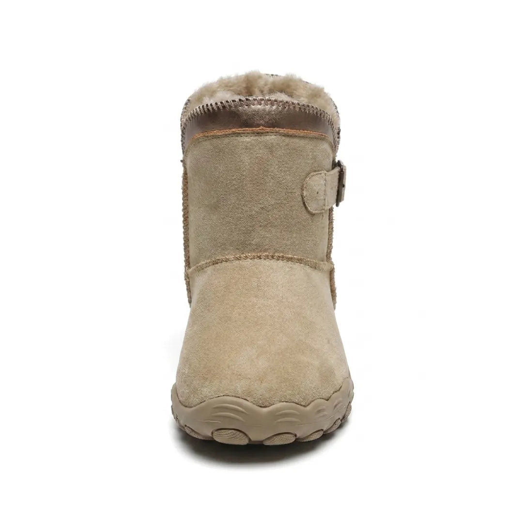 Front view of a beige suede boot showing the rounded wide toe and fleece collar 8