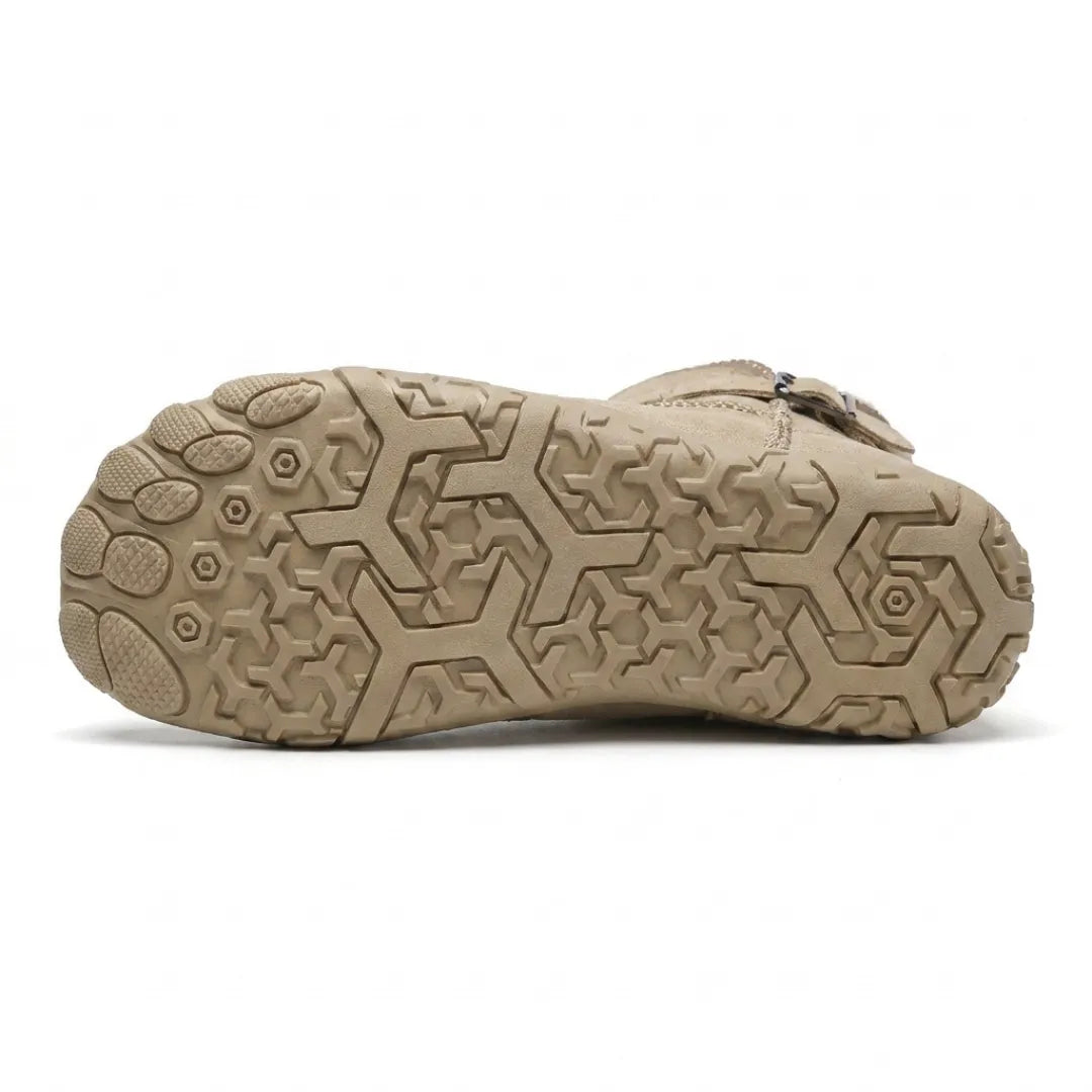 Underside of a beige boot showing the hexagonal tread pattern and separate toe pads 9