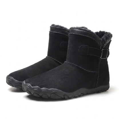 Pair of black suede boots with dark fleece lining, buckled strap and wide, flexible sole 16
