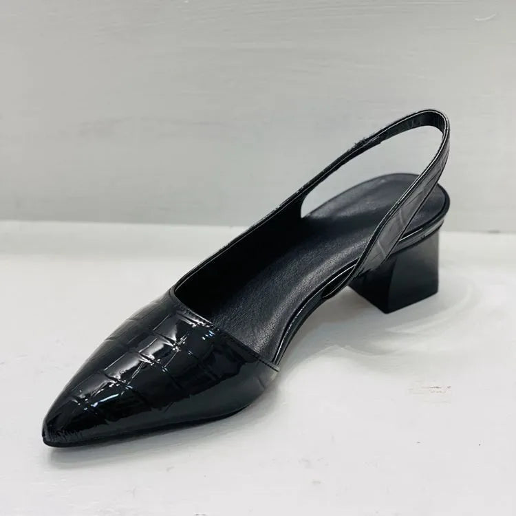 Black glossy slingback photographed from the opposite side, showing the pointed toe and heel strap 6