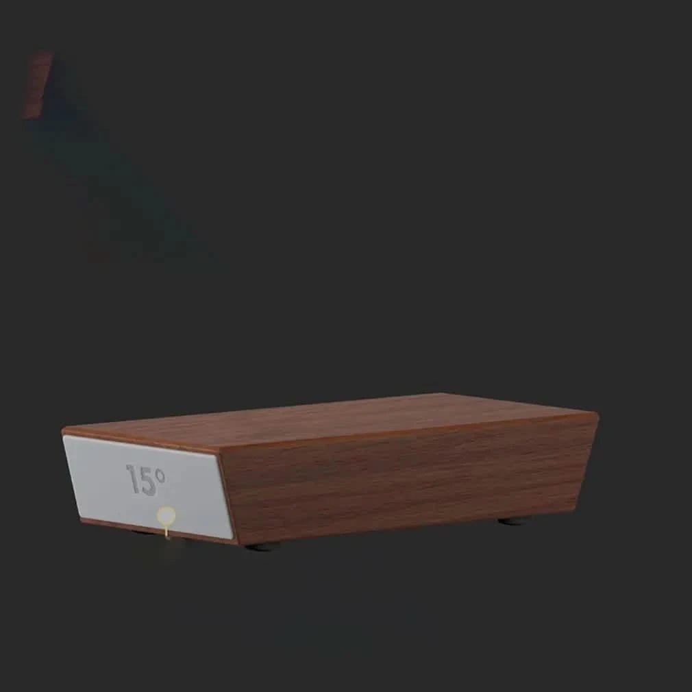 Wooden angle guide block with a pale grey magnetic end face, shown from the side against a dark background. 3
