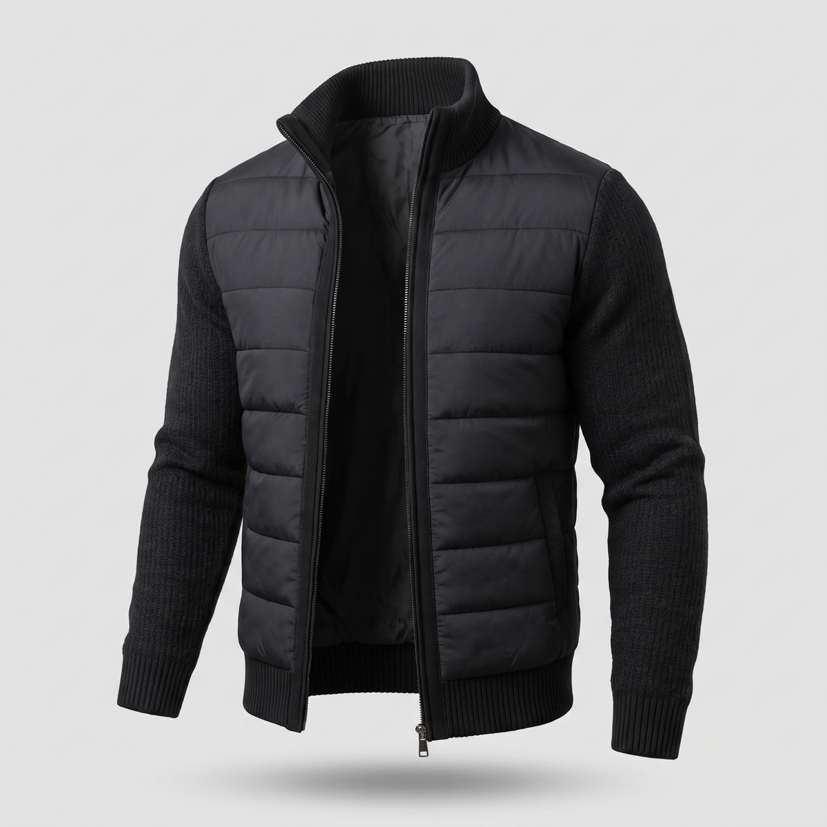 Black quilted jacket with ribbed knit sleeves and stand collar, angled view with zip open 6