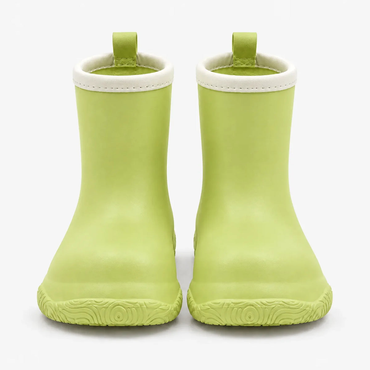 Pair of light green wellies from the front, with cream collars, matching pull loops and a swirl-patterned sole. 7