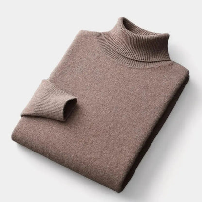 Folded roll-neck jumper in warm taupe brown, with the ribbed collar and one cuff showing 9