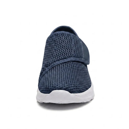 Front view of a navy mesh shoe showing the rounded wide toe and the strap across the instep. 8