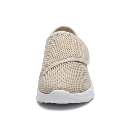 Front view of a beige mesh shoe showing the wide toe box and hook-and-loop strap over the instep. 35