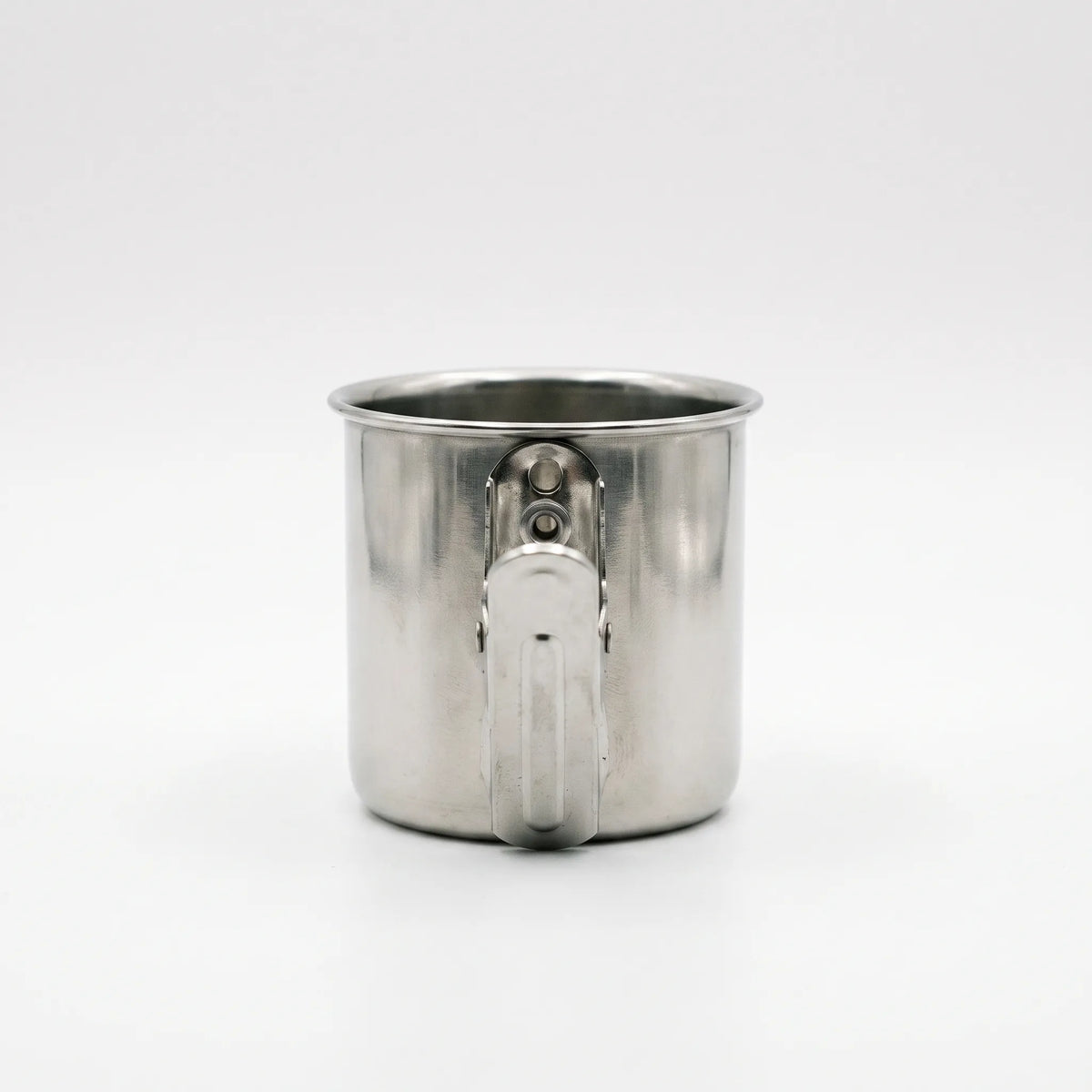 Rear view of a steel cup showing the metal clip fastened to its side, against a plain background. 4