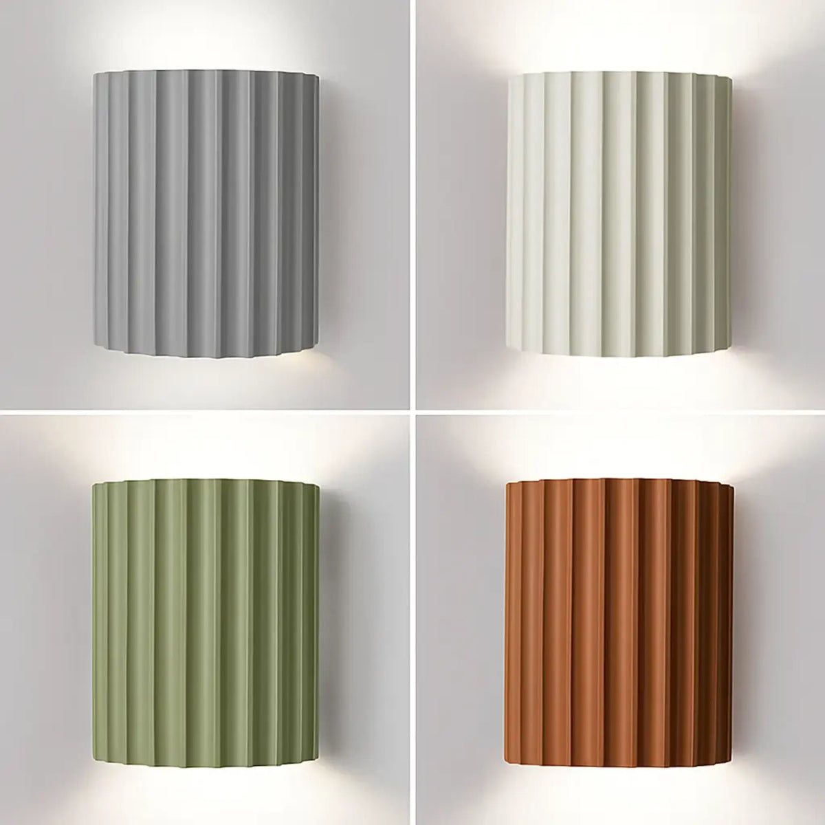 Four fluted half-cylinder wall lights in grey, cream, green and terracotta, each glowing up and down 1