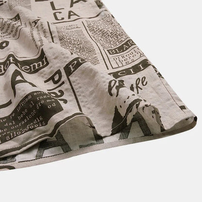 Shirt with Newspaper Print and Button Closure - Milo