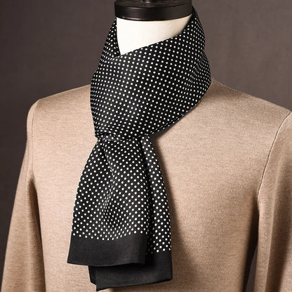 Black silk scarf with fine white polka dots and plain black ends, draped on a mannequin in a beige jumper. 14