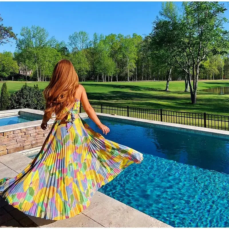 Printed summer dress with plunging neckline and bow detail – Vivienne