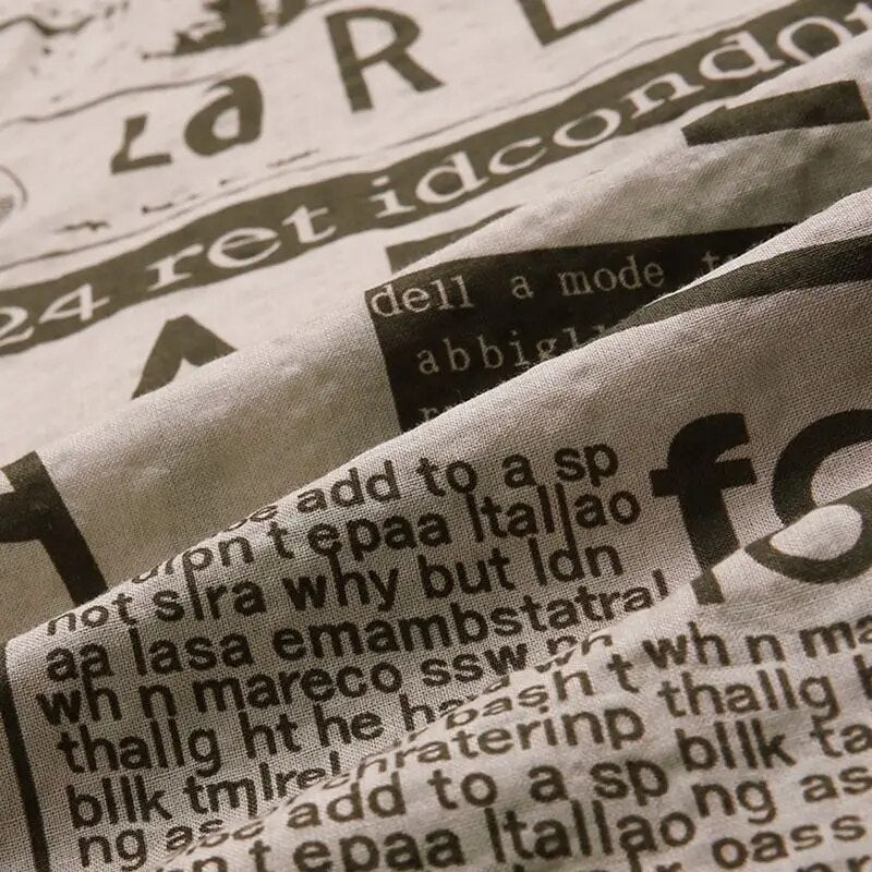 Shirt with Newspaper Print and Button Closure - Milo