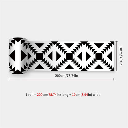 Partly unrolled strip with a bold black and white geometric triangle pattern 48