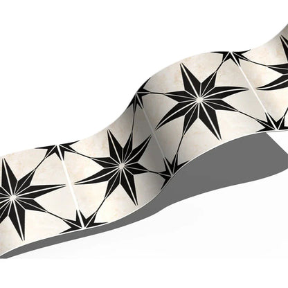Close-up of a curving strip with black eight-pointed stars on a cream marble-effect background 63