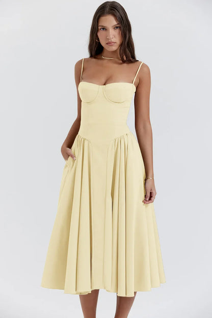 Stylish summer dress with spaghetti straps and a waist cinch – Mira