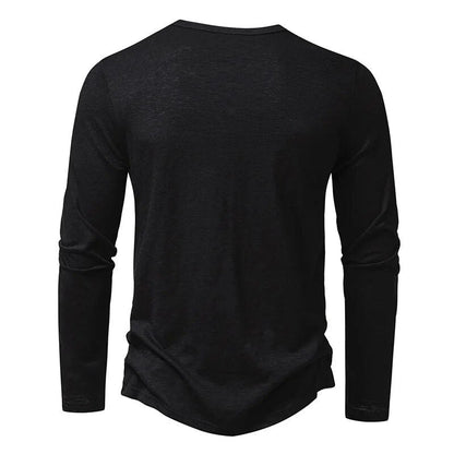Back view of the black long-sleeved Henley, showing the plain back and round neckline. 17