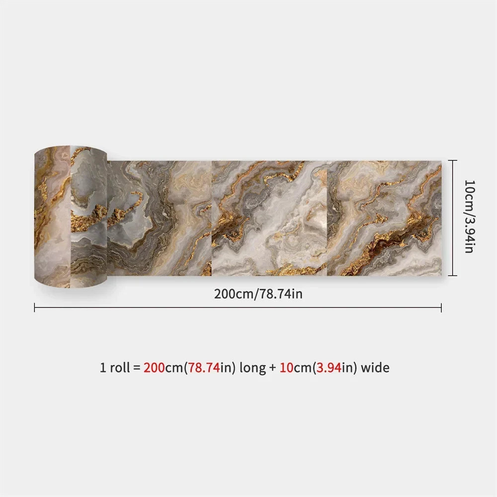 Partly unrolled strip with swirling marble pattern in grey, cream and gold veining 53