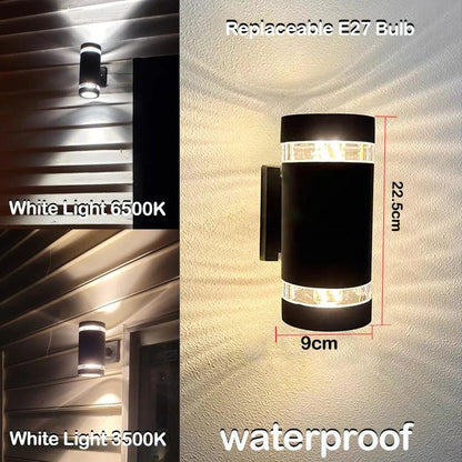 Short black cylindrical wall light with clear bands at each end, dimensions marked, shown in white and warm light on cladding. 10