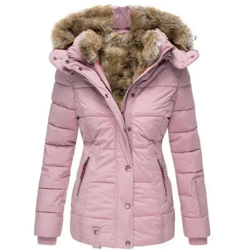 Front view of the quilted parka in soft pink, with a faux fur-lined hood, ribbed knit cuffs and zipped hand pockets. 6