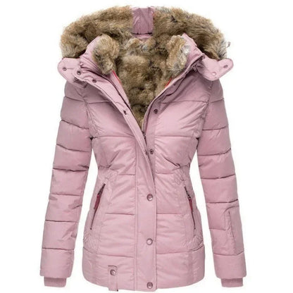 Front view of the quilted parka in soft pink, with a faux fur-lined hood, ribbed knit cuffs and zipped hand pockets. 6