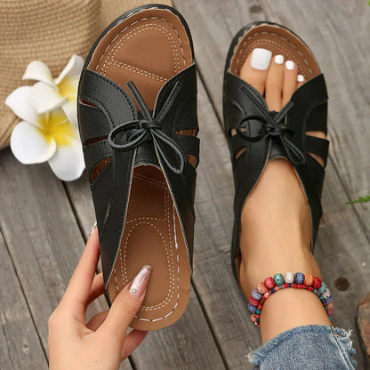Orthopaedic wedge sandals with a domed button – Mirella