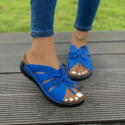Orthopaedic wedge sandals with a domed button – Mirella