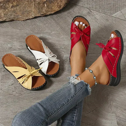 Orthopaedic wedge sandals with a domed button – Mirella