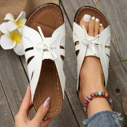 Orthopaedic wedge sandals with a domed button – Mirella